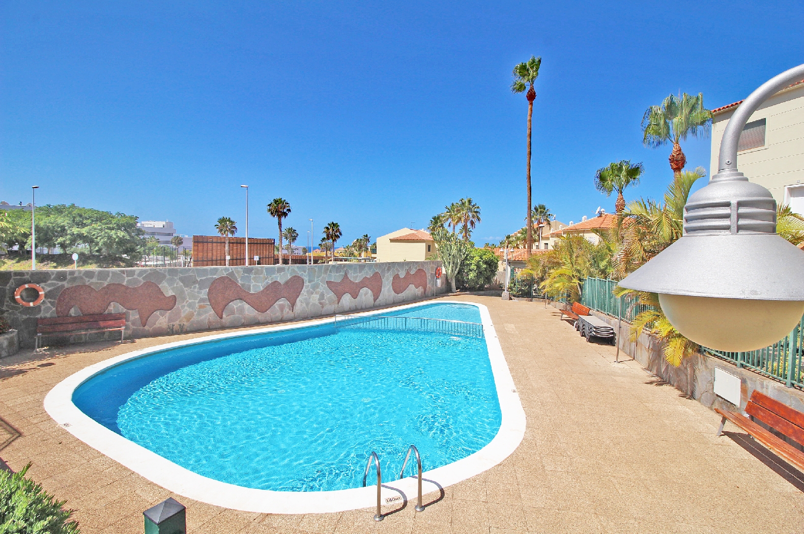 Duplex in El Duque marketed by Clear Blue Skies